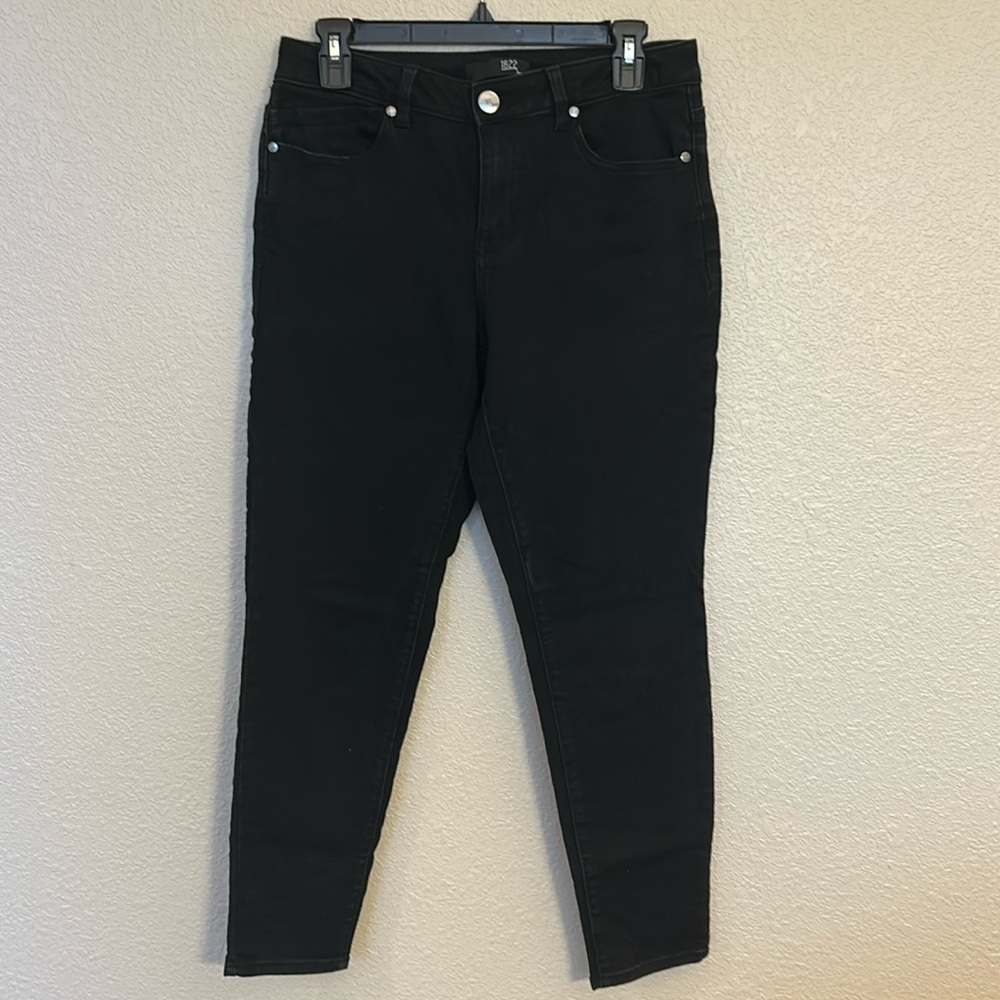 Women’s black skinny jeans size 10.